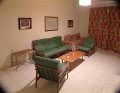 Kaccatur Flats - Maryanne-Joe Apartments - Living Room